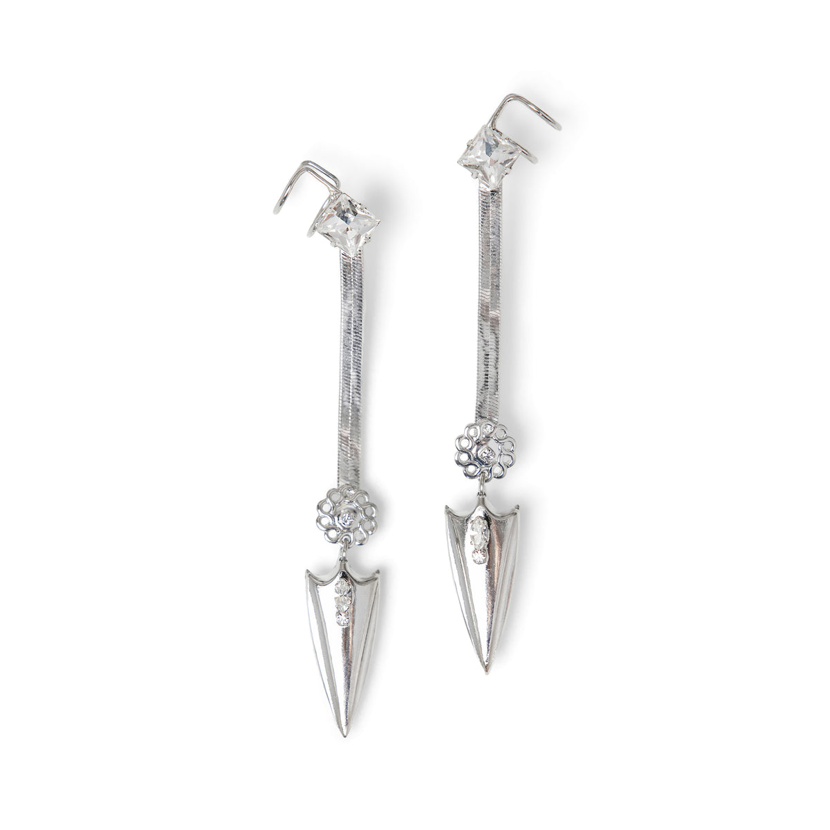 A pair of silver-toned dangle snake chain earrings with attached faux cuff and clear Swarovski crystal accents, and pointed arrowhead charm at the bottom, shown on a plain white background