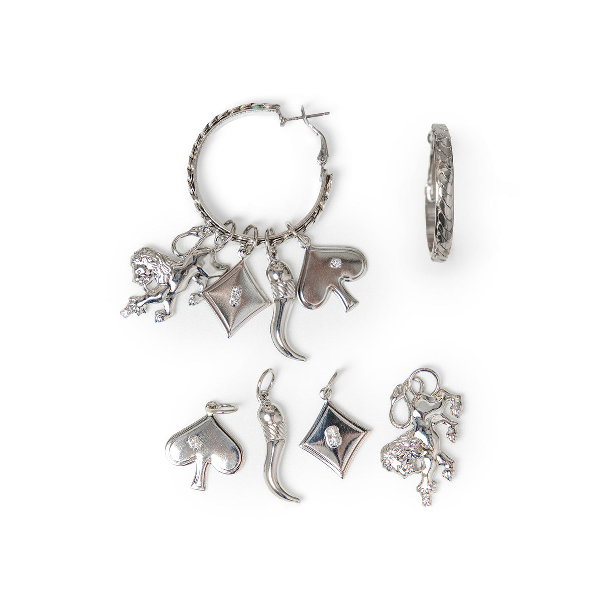 Silver-toned hinge hoop earrings with vintage chain details with four removable charms: lion, diamond, chili pepper, and spade with clear Swarovski crystal accents.