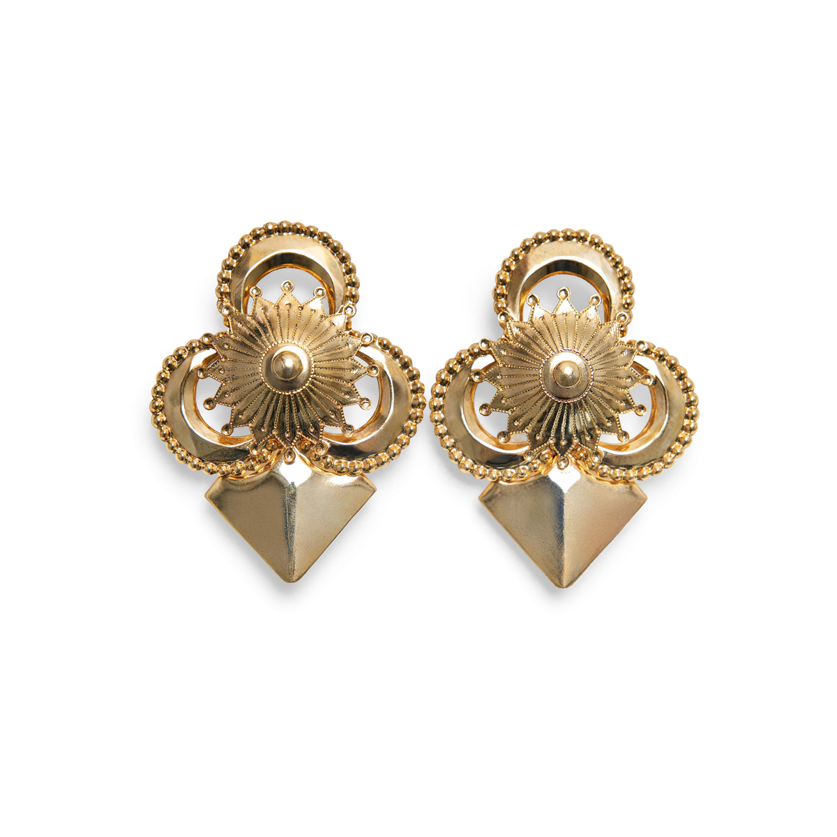 A pair of gold-toned geometric stud earrings with intricate detail, and a pointed triangular base on a white background